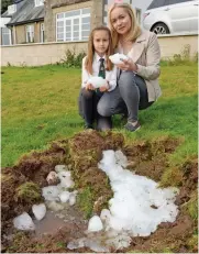  ??  ?? Crater: Mrs Helliwell and Elise with the ice