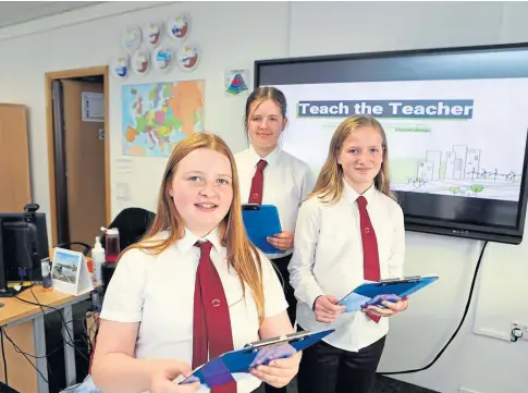 ?? ?? TEACHING THE TEACHER: Chloe Hutchison, Scarlett Forrester and Kirsty Steinson. Picture by Gareth Jennings.