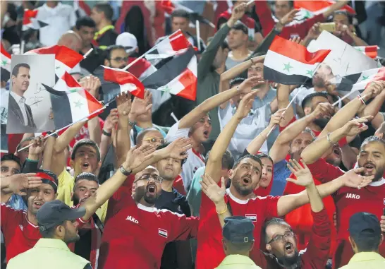  ?? Pictures / AP ?? Syria's emotional World Cup qualifying run, including a 2- 2 draw with Iran on Wednesday, is not the fairytale it might seem.