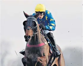  ??  ?? Big win: Ian Popham triumphs on Annacotty in the Kauto Star Chase in 2013