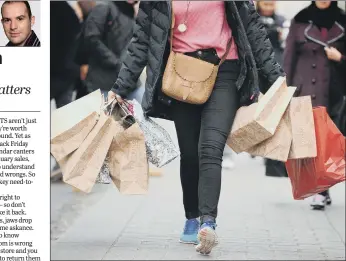  ?? PICTURE: PA WIRE ?? BIG SHOP: Thousands queued for bargains and splashed out on Black Friday