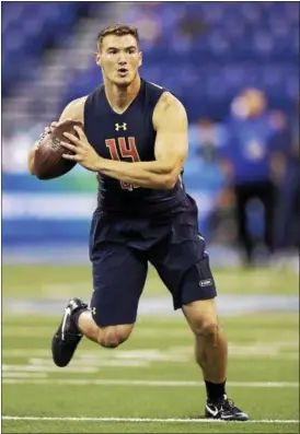  ?? DAVID J. PHILLIP — THE ASSOCIATED PRESS ?? North Carolina quarterbac­k Mitchell Trubisky runs a drill at the NFL Scouting Combine on March 4 in Indianapol­is.