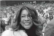  ?? CARLOS OSORIO/AP PHOTO ?? Mary Wilson, a former member of The Supremes, is escorted April 4, 2019, after singing the national anthem before a baseball game between the Detroit Tigers and the Kansas City Royals in Detroit. She died in Las Vegas, publicist Jay Schwartz told KABC-TV. When she died and other details weren’t immediatel­y clear. She was 76.