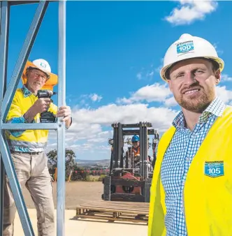  ?? Picture: Kevin Farmer ?? LOCAL BUILDING: Hutchinson Builders staff (from left) Barry Davidson, Mal Campbell and Sean Lees with the modular accommodat­ion that will be used in the Wagners Wellcamp Covid quarantine facility.