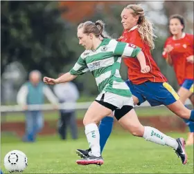  ??  ?? Strong run: Western Springs’ Lily-Rose Dyer and Lynn Avon’s Liz Anton tussle for the ball.