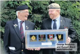  ??  ?? George Reynolds and Russell Black were honoured