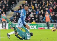  ?? Picture: AFP ?? A CERTAINTY: Manchester City’s Kelechi Iheanacho (top) scores past a sparwling Hull City’s David Marshall in their English Premier League clash in Kingston upon Hull on Boxing Day