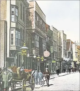  ??  ?? The High Street in Edwardian times, with the iconic Elizabetha­n Guest House seen second from left