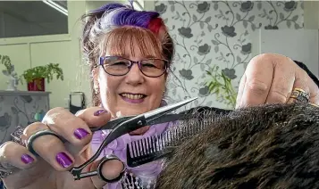  ?? WARWICK SMITH/STUFF ?? Indigo Hair Design owner Valerie O’donnell is ready to bow out of hairdressi­ng.