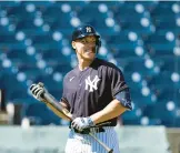  ?? DAVID J. PHILLIP/AP ?? The Yankees’ Aaron Judge walks back to the dugout after hitting during a spring training workout Monday in Tampa, Florida.