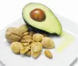  ??  ?? Avocados and walnuts are rich in DHA fats.