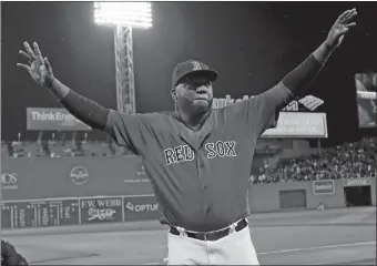  ?? ELISE AMENDOLA/AP PHOTOS ?? Boston’s David Ortiz waves to fans Friday as he is honored before the Red Sox’s game against Toronto at Fenway Park. In the game, Ortiz hit a go-ahead home run, below, in a 5-3 win.