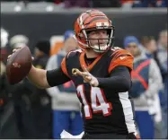  ?? FRANK VICTORES - THE ASSOCIATED PRESS ?? FILE - In this Dec. 15, 2019, file photo, Cincinnati Bengals quarterbac­k Andy Dalton passes in the first half of an NFL football game against the New England Patriots in Cincinnati. The Bengals cleared the way for Joe Burrow to lead the team by releasing quarterbac­k Andy Dalton, who holds several of the franchise’s passing records but couldn’t lead the woebegone Bengals deep into the playoffs. The move Thursday, April 30, 2020, gives Dalton, who had a year left on his deal, a chance to compete for a job with another team.