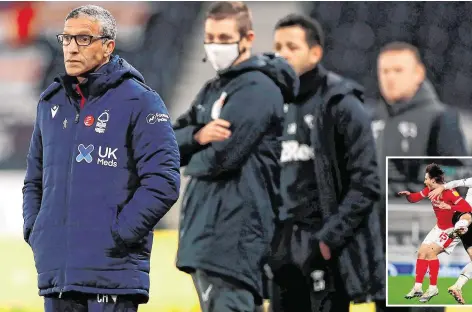  ?? PA ?? Bitter rivals: Nottingham Forest manager Chris Hughton watches on during last night’s game against Derby at Pride Park; Ireland internatio­nal Jason Knight (inset) battles for possession with Forest’s Luke Freeman