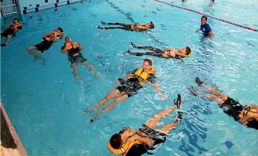  ??  ?? Drowning Prevention Auckland encourages learning to float as a life-saving measure.