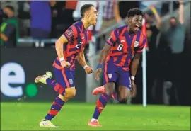  ?? Omar Vega Getty Images ?? SERGIÑO DEST, left, celebrates with Yunus Musah after scoring the tying goal for the U.S. in the first half against a veteran Costa Rica that took an early lead.