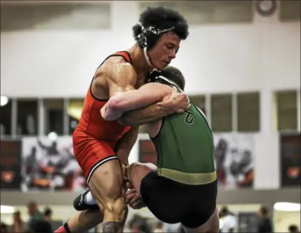  ?? UNIVERSITY OF FINDLAY ATHLETICS ?? Harvey grad Alonzo Turner is 18-8 this season as a 165-pound wrestler for the University of Findlay.