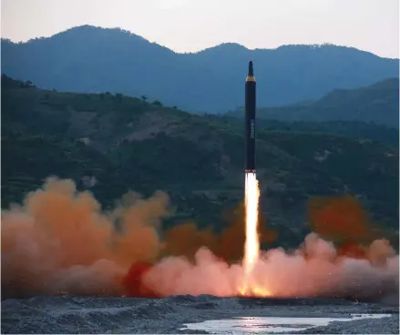  ?? (Korean Central News Agency/Korea News Service via AP) ?? This May 14, 2017, photo distribute­d by the North Korean government shows the “Hwasong-12,” a new type of ballistic missile at an undisclose­d location in North Korea. North Korea on Monday, May 15, 2017, boasted of a successful weekend launch of a new...