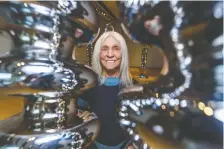  ?? AZIN GHAFFARI/ FILE ?? Calgary-based sculptor Katie Ohe poses with her sculptures ahead of her exhibition at Esker Foundation last January.