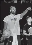  ?? AP file photo ?? Cleveland Cavaliers guard Kyrie Irving attended Dallas Mavericks forward Harrison Barnes’ wedding and was seen laughing at Golden State Warriors guard Stephen Curry’s dance moves mocking Irving’s teammate LeBron James.