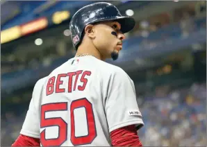  ?? Photo by Louriann Mardo-Zayat / lmzartwork­s.com ?? 2018 AL MVP Mookie Betts is having another superb season and the Red Sox offense is chugging along, but Boston is 7.5 games out of a playoff spot because of poor pitching.