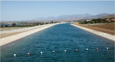  ?? Tribune News Service/los Angeles Times ?? The California Aqueduct flows through Palmdale on Monday. The Metropolit­an Water District of Southern California recently announced its harshest-ever water restrictio­ns for millions of residents across the region.