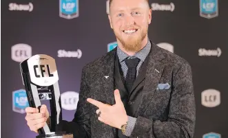  ?? PETER POWER ?? Stampeders quarterbac­k Bo Levi Mitchell was named the CFL’s Most Outstandin­g Player at Thursday’s CFL Awards dinner in Toronto. The Stamps dominated the awards, capturing five.