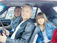  ?? PNG FILES ?? Left: One-year-old Paul Schatzley looks thrilled to be riding in his father’s nearly new 1965 Mustang. Right: Samantha and Paul Schatzley with daughter Livia enjoying an outing in the freshly restored Mustang that had been purchased new by his father.