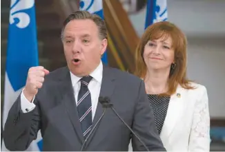  ?? JACQUES BOISSINOT LA PRESSE CANADIENNE ?? Le chef de la Coalition avenir Québec, François Legault, et sa porte-parole en matière d’immigratio­n, Nathalie Roy