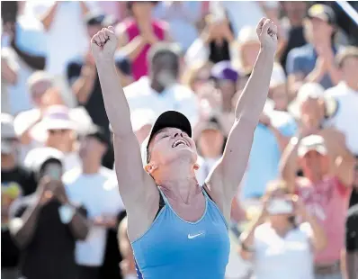  ?? NATHAN DENETTE THE CANADIAN PRESS ?? Simona Halep celebrates winning the National Bank Open on Sunday afternoon in Toronto. She also won the title in 2016 and 2018 when it was called the Rogers Cup.