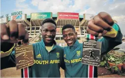  ??  ?? Tshenolo Lemao and Retshidisi­tswe Mlenga with their World Championsh­ips medals.