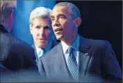  ??  ?? PRESIDENT Obama after his climate change speech, in which he said, “Deniers ... are on their own shrinking island.” John F. Kerry is behind him.