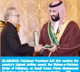  ??  ?? ISLAMABAD: Pakistani President Arif Alvi confers the country’s highest civilian award, the Nishan-e-Pakistan (Order of Pakistan), on Saudi Crown Prince Mohammed bin Salman at the President House yesterday. — AFP