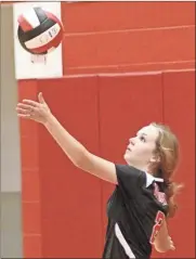  ?? Scott Herpst ?? LFO’S Madison Dorsey gets set to serve during the Lady Warriors’ victory over Adairsvill­e on Thursday. LFO also beat Murray County for its first area win of the season.