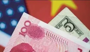  ?? REUTERS PIC ?? China’s foreign exchange reserves rose US$129.4 billion last year to US$3.14 trillion, as tight regulation­s and a strong yuan continued to discourage capital outflows.