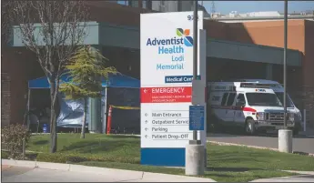  ?? BEA AHBECK/NEWS-SENTINEL ?? A screening tent is set up outside Adventist Health Lodi Memorial Hospital in Lodi on Friday for anyone concerned they might have the coronaviru­s.