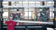  ?? EUROPA PRESS VIA AP ?? Containers are loaded on a truck at Madrid Zoo in Spain on Feb 29 as staff prepare to transport a family of five pandas back to China.