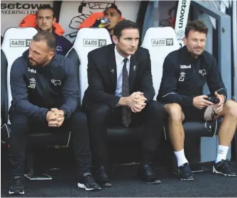  ??  ?? Promise...Derby County manager Frank Lampard (centre) has made an impressive start to his new career