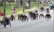  ?? / Kevin Myrick, SJ File ?? Wheelchair racers from around the globe will take off on College Street for their annual race in Cedartown on July 5.