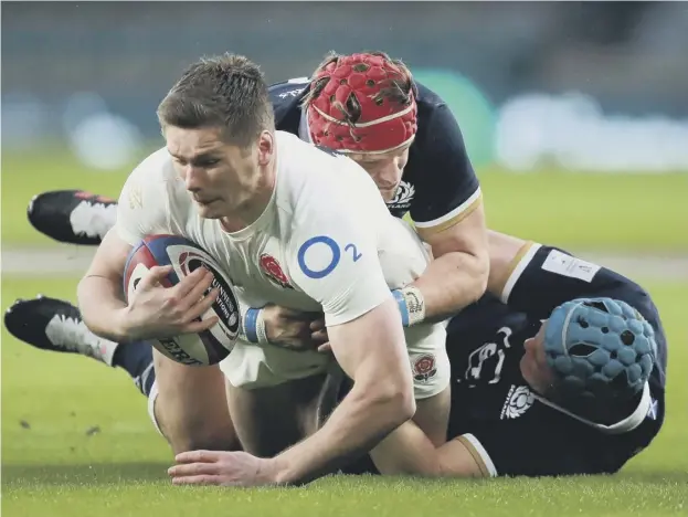  ??  ?? 0 George Hunter stops Owen Farrell in his tracks in a match when England were reduced to impotence by Scotland’s performanc­e