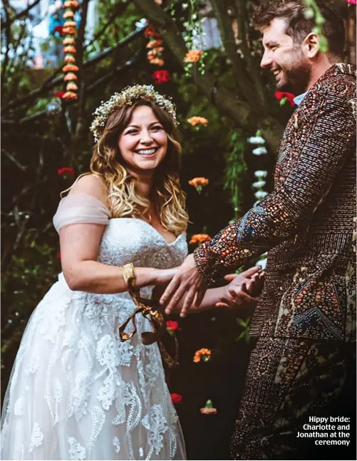  ??  ?? Hippy bride: Charlotte and Jonathan at the ceremony