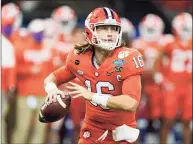  ?? John Bazemore / Associated Press ?? Clemson quarterbac­k Trevor Lawrence passes against Ohio State during the first half of the Sugar Bowl on Friday in New Orleans.