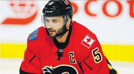  ?? AL CHAREST ?? Captain Mark Giordano, along with Dougie Hamilton and T.J. Brodie, gives the Flames a great core on the blueline. They’re looking to add a quality fourth man to that group.