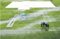  ?? PHOTO: GETTY IMAGES ?? Dismal scene . . . Torrential rain washed out the entire day’s first play of the second test between New Zealand and Bangladesh at the Basin Reserve in Wellington yesterday. Play has been scheduled to start 30 minutes earlier today to try to make up some of the overs lost but rain is forecast until at least noon with showers expected for the rest of the day. Showers are also forecast for tomorrow and not expected to clear until Monday. New Zealand leads the threematch series 10 after an innings and 52run victory in the first test in Hamilton.