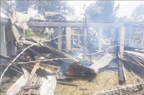  ??  ?? The burnt remains of the house after the fire yesterday morning