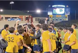  ?? ANDRE C. FERNANDEZ ?? The Belen boys’ soccer team celebrates after winning its second state championsh­ip.