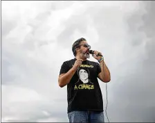  ?? MEGHAN MCCARTHY / DAILY NEWS ?? Manuel Oliver, father of Marjory Stoneman Douglas High School shooting victim Joaquin Oliver, speaks during the diein event along Flagler Drive on Tuesday.