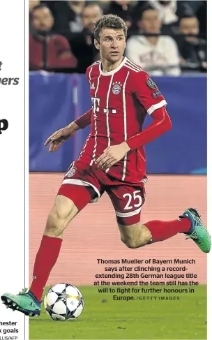  ?? /PAUL ELLIS/AFP /GETTY IMAGES ?? Thomas Mueller of Bayern Munich says after clinching a recordexte­nding 28th German league title at the weekend the team still has the will to fight for further honours in Europe.