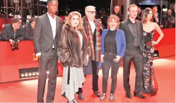  ??  ?? Director and screenwrit­er Andre Techine, screenwrit­er Lea Mysius and actors Catherine Deneuve, Stephane Bak, Kacey Mottet Klein and Tam Slimani arrive for the screening of the movie ‘Farewell to the Night’ at the 69th Berlinale Internatio­nal Film Festival on Tuesday. — Reuters photo
