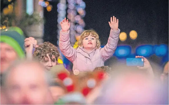  ?? ?? TWINKLE, TWINKLE: Crowds at the Christmas lights switch-on last month as part of the Perth Winter Festival. Picture by Steve Macdougall.